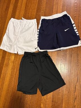 2 Nike dri fit youth shorts size 12 & champion shorts